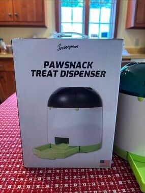 Pawsnack treat dispenser. Brand new dog treat dispenser